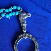MAGNIFING GLASS NECKLACE